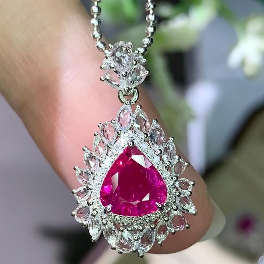 14k Gold 1.38 Ct Natural Ruby & Diamond & Sapphire Pendant( Without Chain ): Ref:231008137 // gold content:14k gold // main gemstone:ruby // shape:pear // carat weight:1. 38ct // color:red // treatment:natural // // adjacent gemstone 2 : diamond // shape:round // clarity