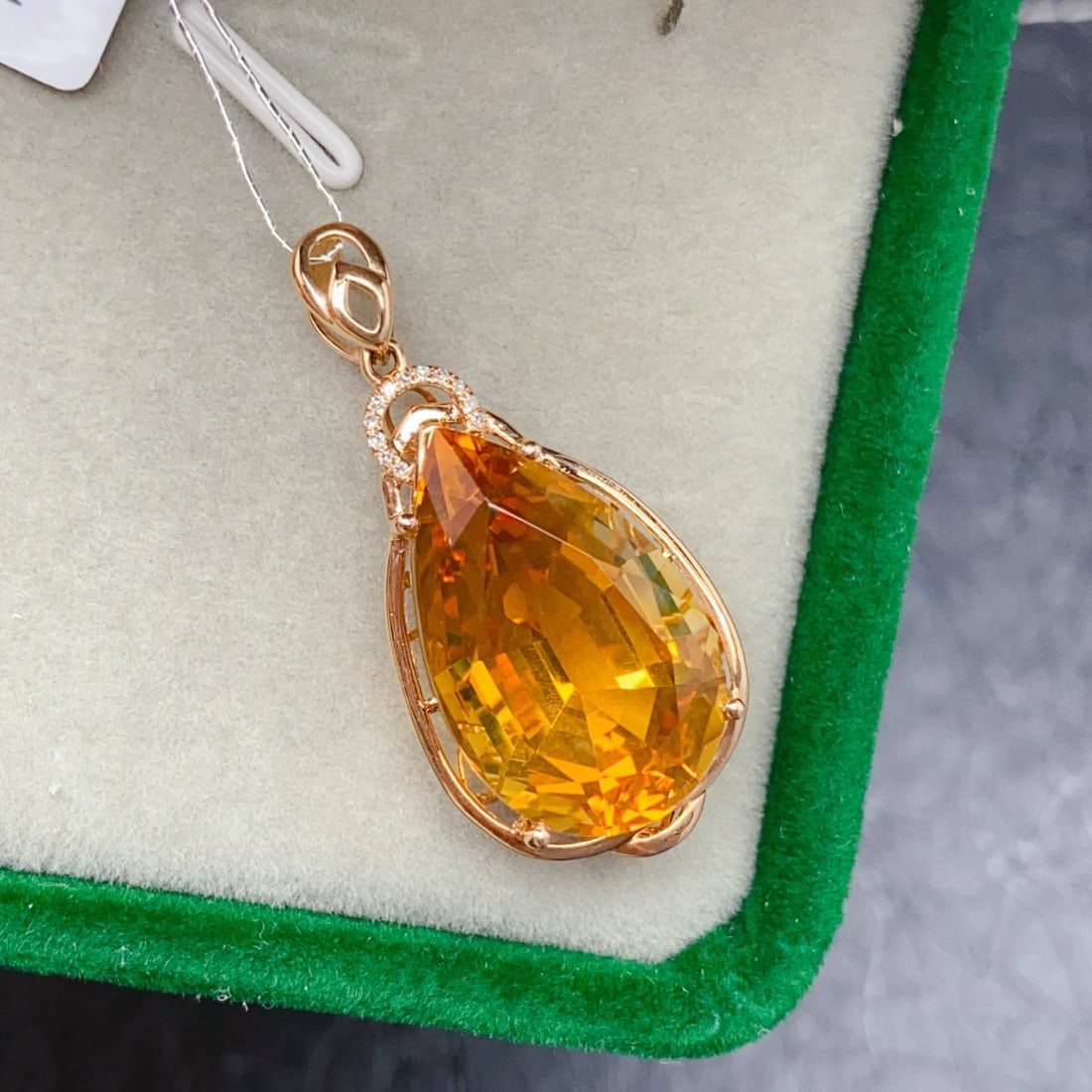 14k Gold 14.43 Ctw Natural Citrine & Diamond Pendant( Without Chain ): Ref:231008143 // gold content:14k gold // main gemstone:citrine // shape:pear // carat weight:14. 4ct // color:yellow // treatment:natural // // adjacent gemstone 2 : diamond // number of stones:12