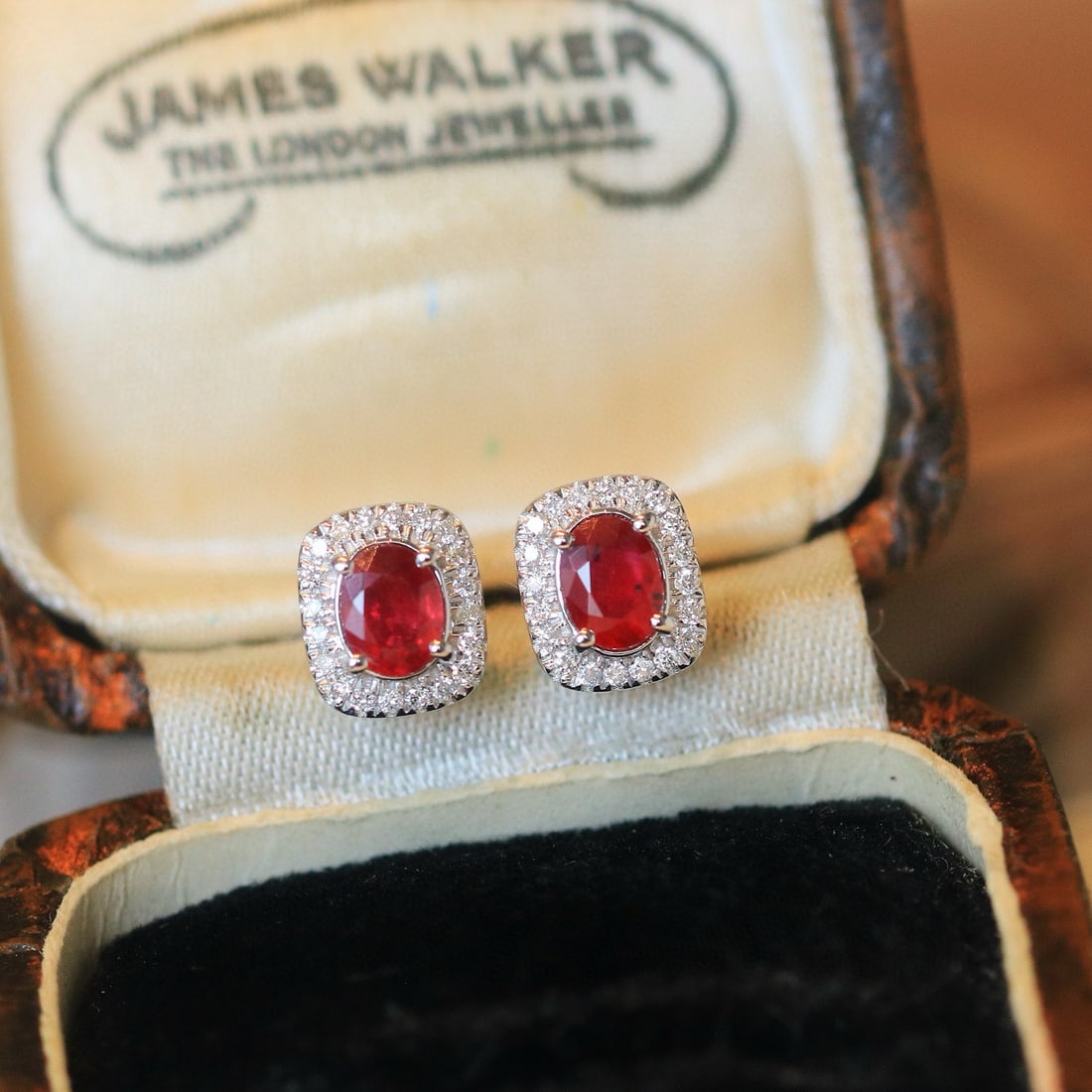 14k Gold 0.86 Ctw Natural Ruby & Diamond Earrings: Ref:231008184 // gold content:14k gold // main gemstone:ruby // shape:oval // carat weight:0. 7ct // color:pigeonblood red // treatment:natural // // adjacent gemstone 2 : diamond // shape:round //