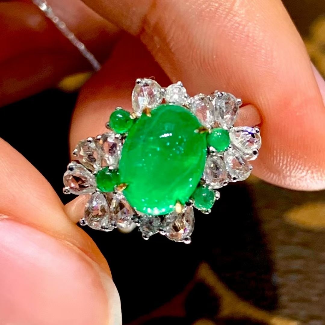 14k Gold 2.2 Ct Vivid Green Natural Emerald & Diamond Ring: Ref:231008188 // gold content:14k gold // ring size:7. 25us // // main gemstone:emerald // shape:oval // carat weight:2. 2ct // color:vivid green // treatment:natural // // adjacent gemstone 2 :