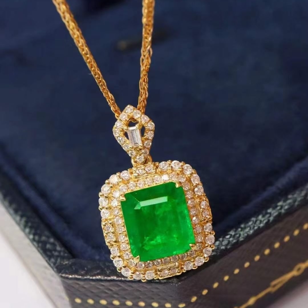 14k Gold 1.68 Ctw Vivid Green Natural Emerald & Diamond Pendant( Without Chain ): Ref:231008205 // gold content:14k gold // main gemstone:emerald // shape:octagonal // carat weight:1. 41ct // color:vivid green // treatment:natural // // adjacent gemstone 2 : diamond // shape:round