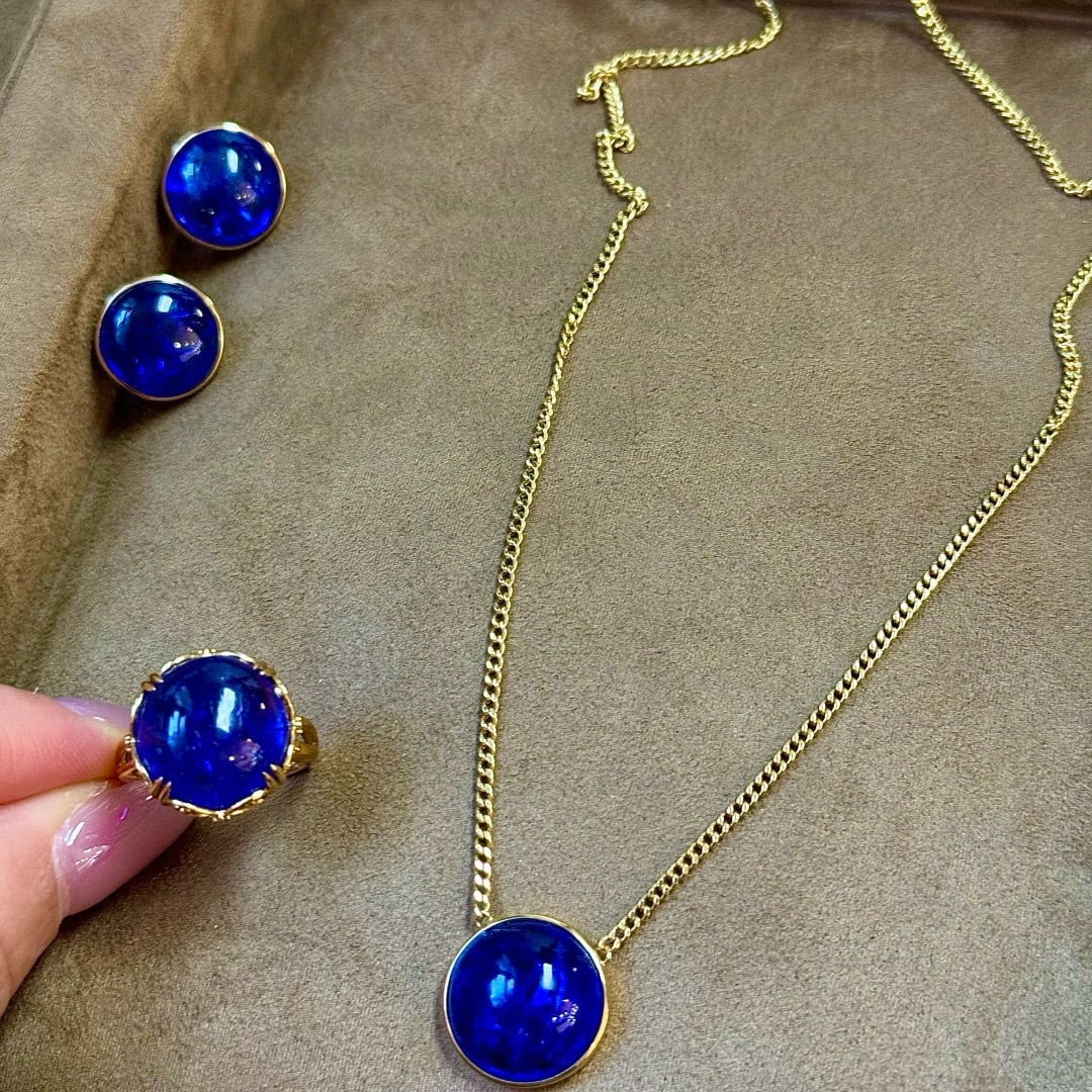 14k Gold 54.08 Ct Natural Tanzanite Jewelry Set: Ref:231008219 // gold content:14k gold // ring size:7. 25us // // necklace // main gemstone:tanzanite // shape:round // carat weight:14. 63ct // color:blue // treatment:natural // cut grade:g // //
