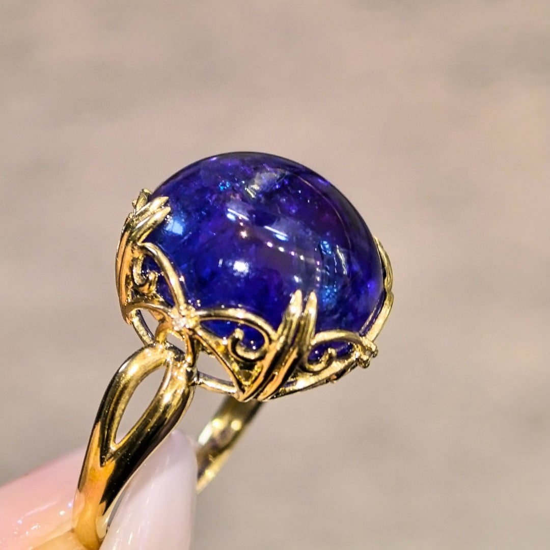 14k Gold 16.45 Ct Natural Tanzanite Ring: Ref:231008222 // gold content:14k gold // ring size:7. 25us // // main gemstone:tanzanite // shape:round // carat weight:16. 45ct // color:blue // treatment:natural // cut grade:g // Condition: New