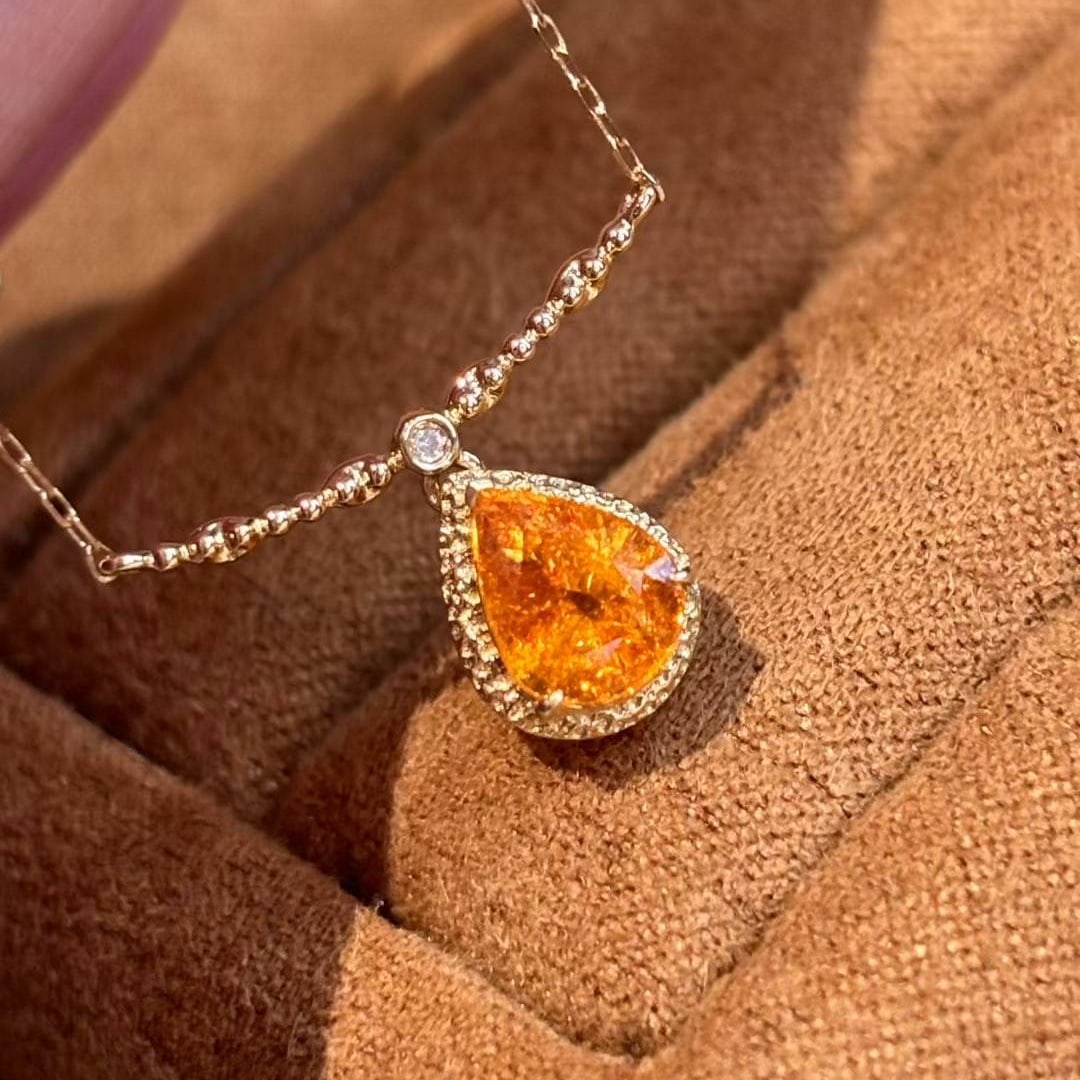 14k Gold 1.45 Ct Natural Spessartine & Diamond Necklace: Ref:231008224 // gold content:14k gold // main gemstone:spessartine // shape:pear // carat weight:1. 45ct // color:orange // treatment:natural // // adjacent gemstone 2 : diamond // shape:round //
