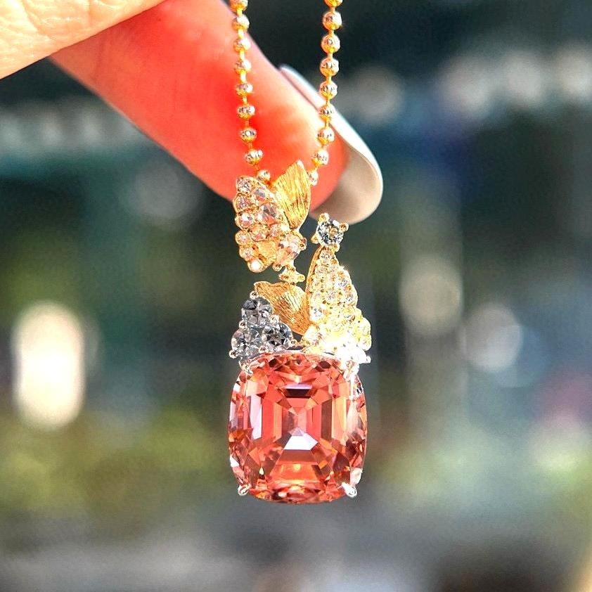 14k Gold 10.28 Ctw Natural Tourmaline & Diamond Pendant( Without Chain ): Ref:231008230 // gold content:14k gold // main gemstone:tourmaline // shape:cushion // carat weight:10. 16ct // color:orange // treatment:natural // // adjacent gemstone 2 : diamond // shape:round // 