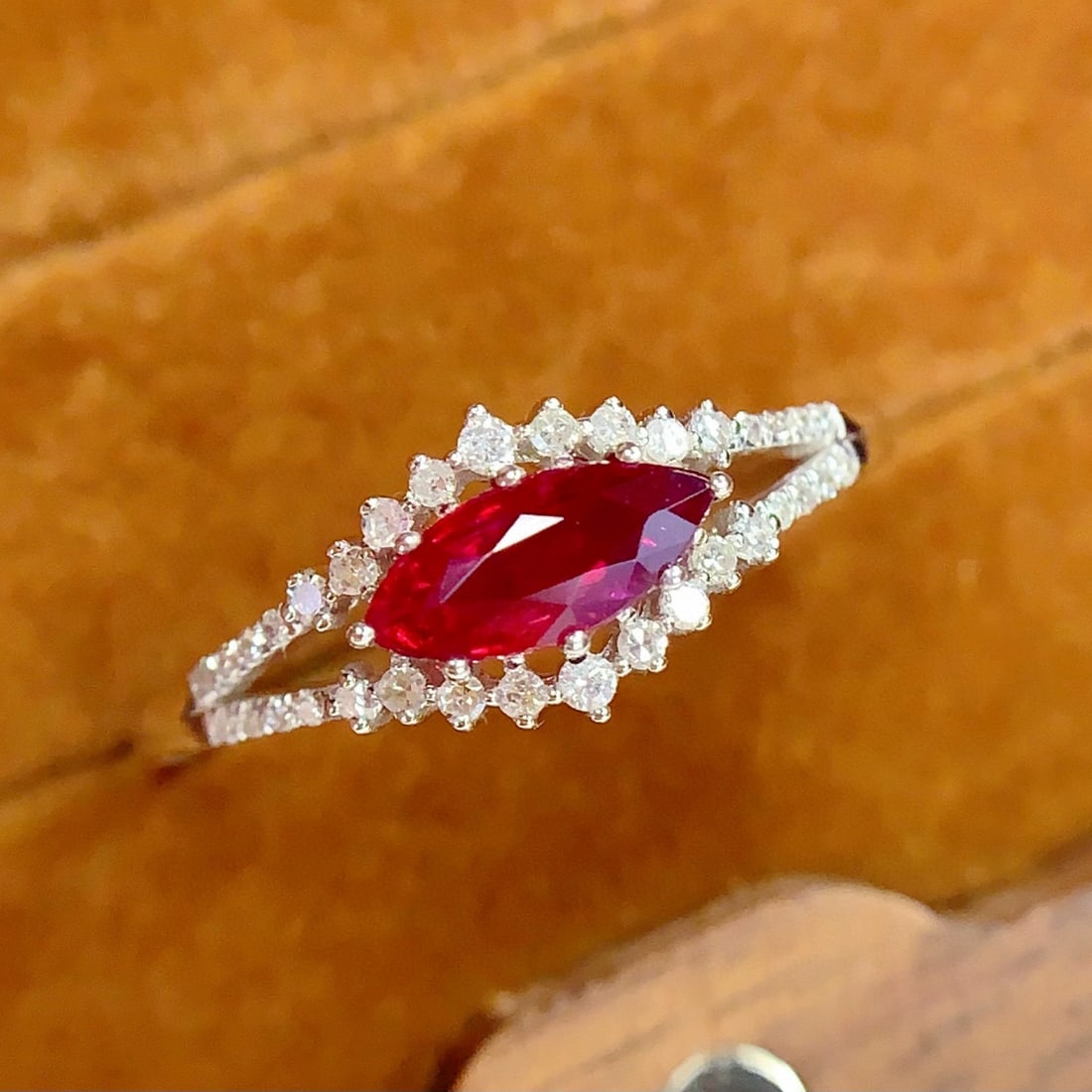 14k Gold 0.85 Ct Vivid Red Natural Ruby & Diamond Ring: Ref:231008240 // gold content:14k gold // ring size:7. 25us // // main gemstone:ruby // shape:marquise // carat weight:0. 85ct // color:vivid red // treatment:natural // // adjacent gemstone 2 : diamo