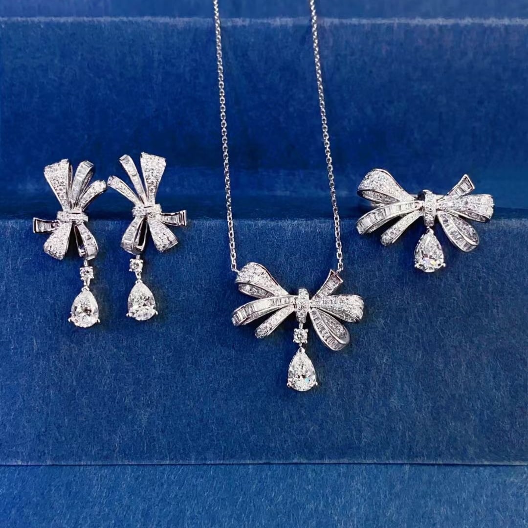 Gia Certified 14k Gold 3.85 Ctw Natural E-f Vs Pear Diamond Jewelry Set: Ref:231008269 // gold content:14k gold // ring size:7. 25us // // earrings // main gemstone:diamond // certified:gia // shape:pear // carat weight:1. 00ct // clarity grade:vs2 // color:e-f //