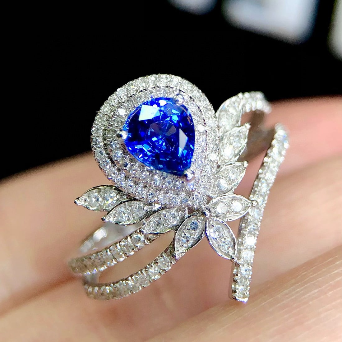 14k Gold 1.07 Ctw Natural Sapphire & Diamond Ring: Ref:231008279 // gold content:14k gold // ring size:7. 25us // // main gemstone:sapphire // shape:pear // carat weight:0. 72ct // color:cornflower blue // treatment:natural // // adjacent gemstone 2