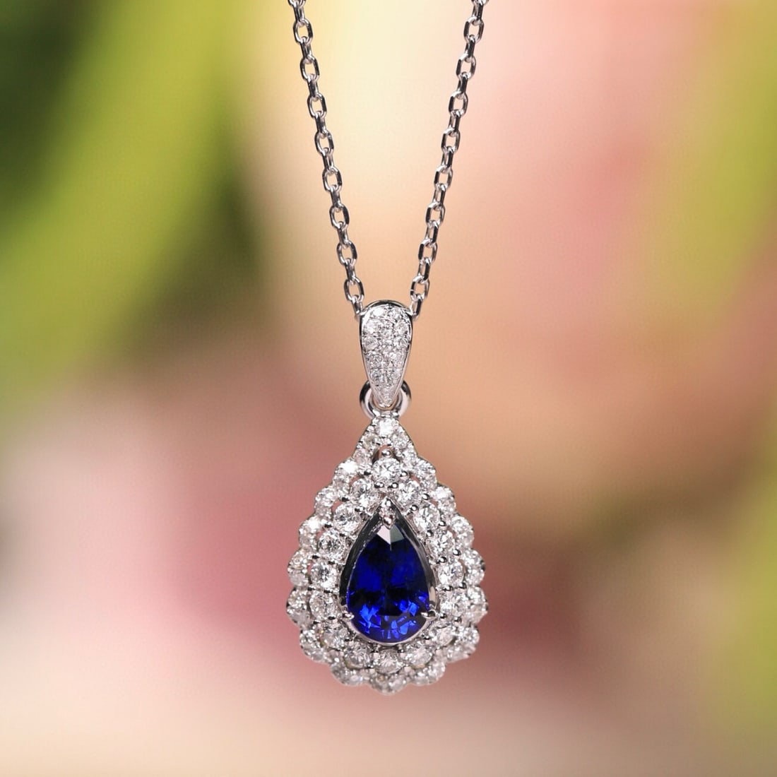 14k Gold 0.64 Ct Vivid Blue Natural Sapphire & Diamond Pendant( Without Chain ): Ref:231008280 // gold content:14k gold // main gemstone:sapphire // shape:pear // carat weight:0. 64ct // color:vivid blue // treatment:natural // // adjacent gemstone 2 : diamond // shape:round //