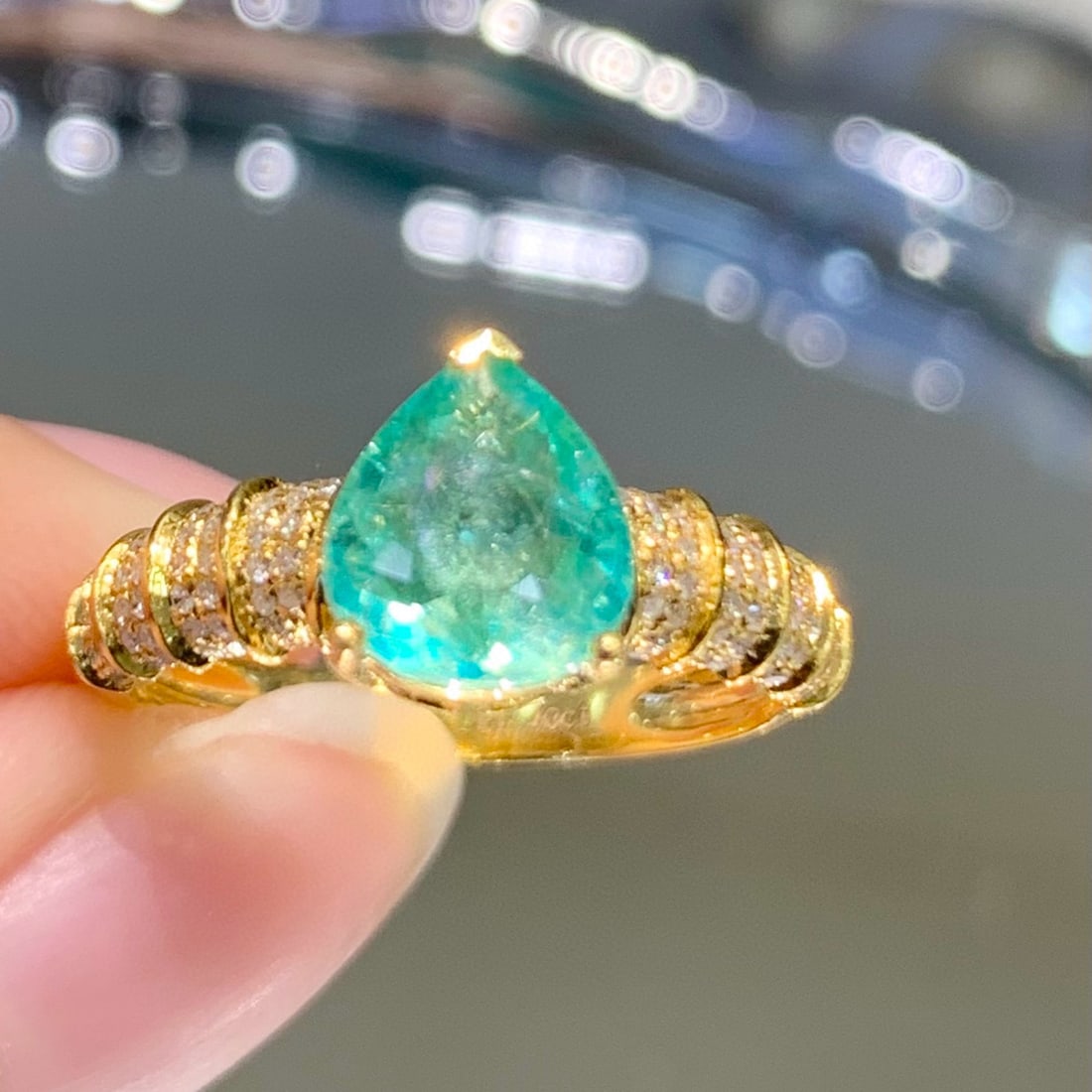 14k Gold 1.4 Ct Natural Paraiba Tourmaline & Diamond Ring: Ref:231008283 // gold content:14k gold // ring size:7. 25us // // main gemstone:paraiba tourmaline // shape:pear // carat weight:1. 4ct // color:green // treatment:natural // // adjacent gemstone 2 :