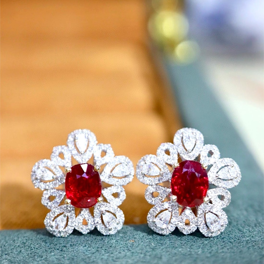 14k Gold 1.89 Ctw Vivid Red Natural Ruby & Diamond Earrings: Ref:231008296 // gold content:14k gold // main gemstone:ruby // shape:oval // carat weight:1. 23ct // color:vivid red // treatment:natural // // adjacent gemstone 2 : diamond // shape:multiply // cara