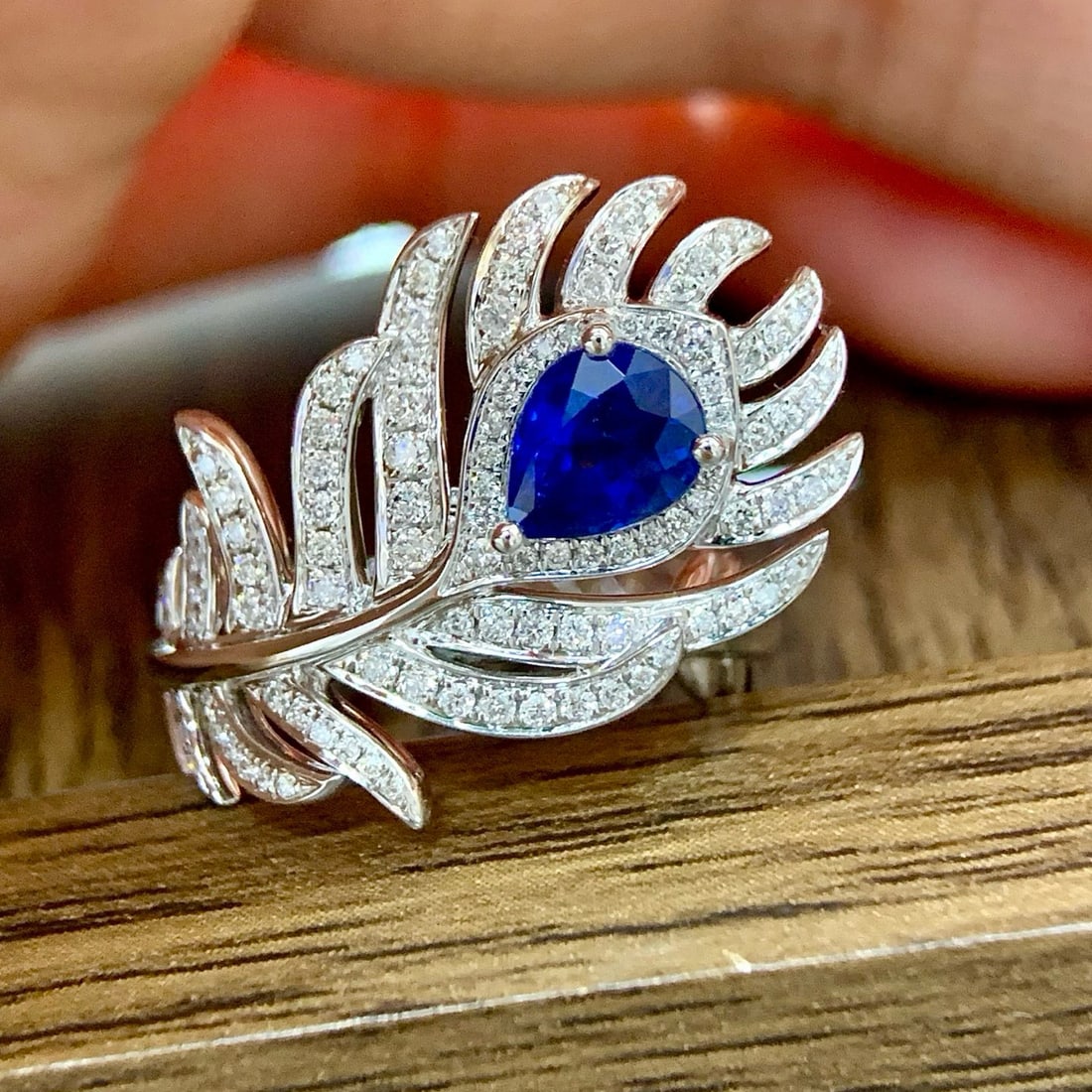 14k Gold 1.26 Ctw Natural Sapphire & Diamond Ring: Ref:231008348 // gold content:14k gold // ring size:7. 25us // // main gemstone:sapphire // shape:pear // carat weight:0. 91ct // color:royal blue // treatment:natural // // adjacent gemstone 2 :