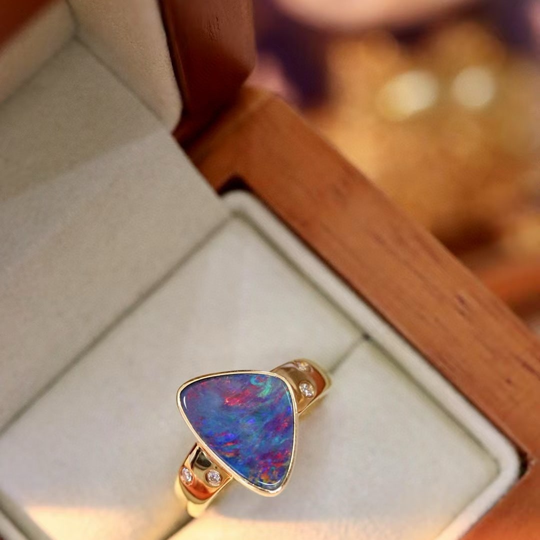 14k Gold 2.44 Ctw Natural Opal & Diamond Ring: Ref:231008379 // gold content:14k gold // ring size:7. 25us // // main gemstone:opal // shape:triangle // carat weight:2. 38ct // color:color // treatment:natural // // adjacent gemstone 2 : diamond /