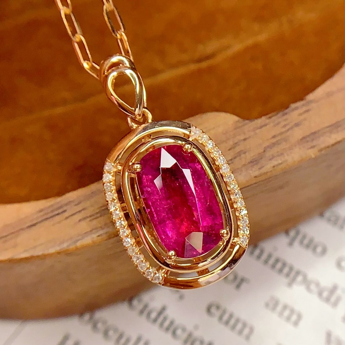 14k Gold 2.5 Ct Natural Tourmaline & Diamond Pendant( Without Chain ): Ref:231008395 // gold content:14k gold // main gemstone:tourmaline // shape:oval // carat weight:2. 5ct // color:red // treatment:natural // // adjacent gemstone 2 : diamond // number of stones:28 // 