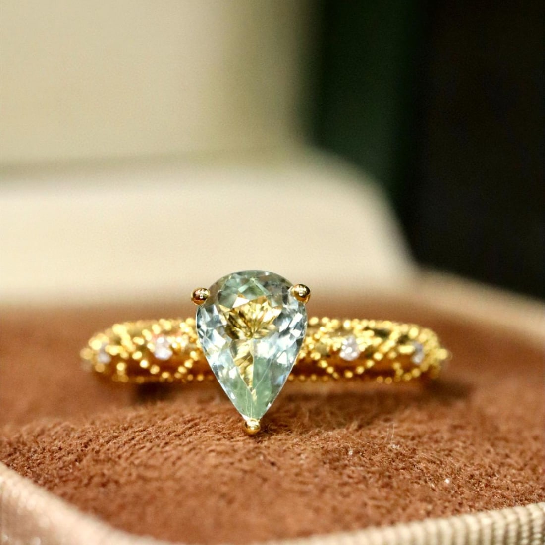14k Gold 0.81 Ctw Natural Paraiba Tourmaline & Diamond Ring: Ref:231008413 // gold content:14k gold // ring size:7. 25us // // main gemstone:paraiba tourmaline // shape:pear // carat weight:0. 76ct // color:green // treatment:natural // // adjacent gemstone 2