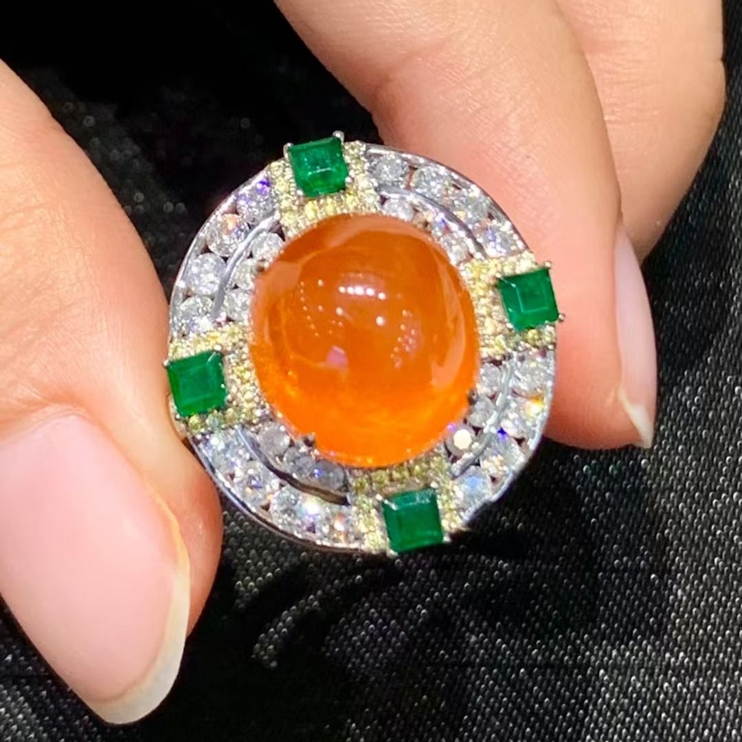 14k Gold 12.1 Ct Natural Spessartine & Diamond & Emerald Ring: Ref:231008414 // gold content:14k gold // ring size:7. 25us // // main gemstone:spessartine // shape:oval // carat weight:12. 1ct // color:orange // treatment:natural // // adjacent gemstone 2 :