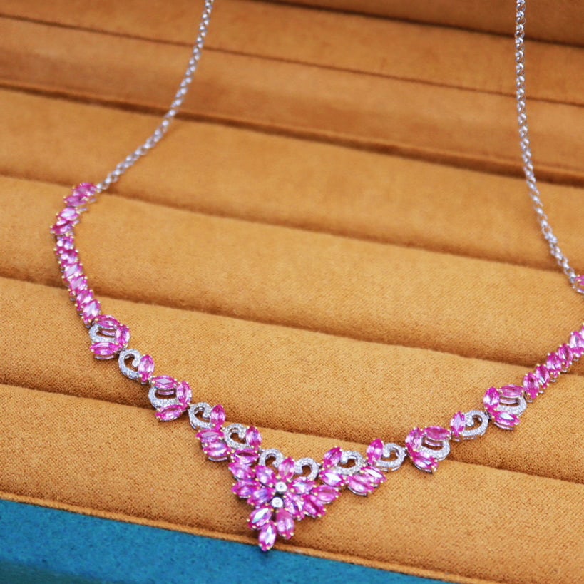 14k Gold 11.03 Ctw Natural Padparadscha Sapphire & Diamond Necklace: Ref:231008416 // gold content:14k gold // main gemstone:padparadscha sapphire // shape:marquise // carat weight:10. 70ct // color:orangish pink // treatment:natural // // adjacent gemstone 2 :