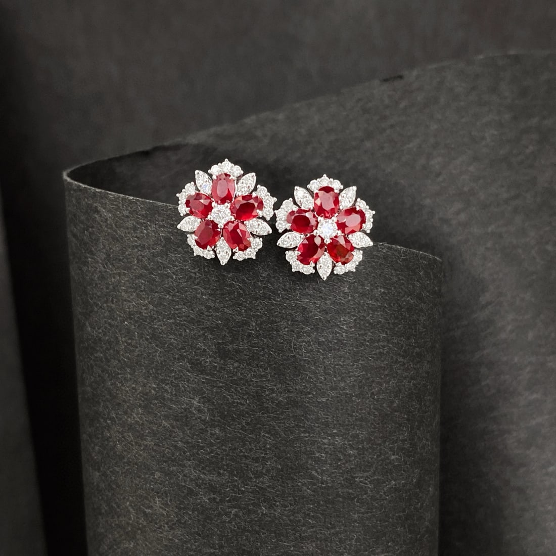 14k Gold 2.45 Ctw Natural Ruby & Diamond Earrings: Ref:231008419 // gold content:14k gold // main gemstone:ruby // shape:oval // carat weight:1. 93ct // color:pigeonblood red // treatment:natural // // adjacent gemstone 2 : diamond // shape:round //