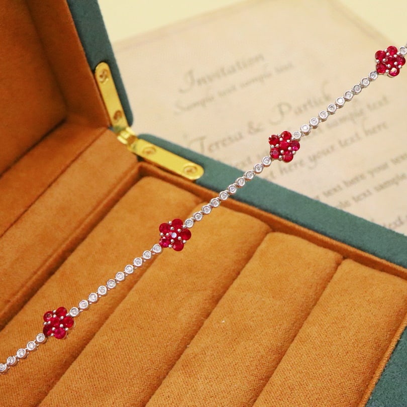 14k Gold 2.13 Ctw Natural Ruby & Diamond Bracelet: Ref:231008425 // gold content:14k gold // main gemstone:ruby // shape:round // carat weight:1. 65ct // color:red // treatment:natural // cut grade:g // // adjacent gemstone 2 : diamond // number of