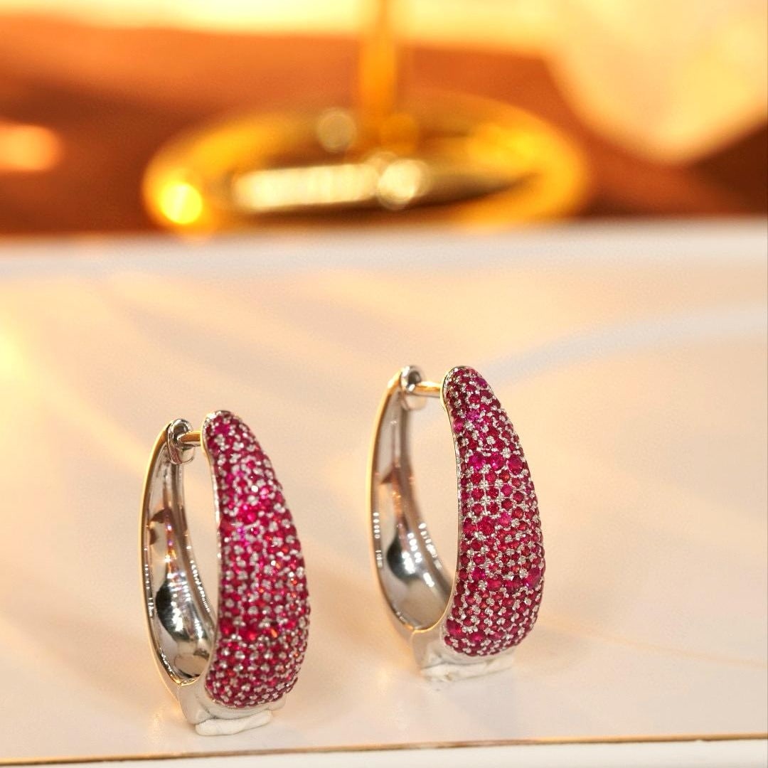 14k Gold 2.0 Ct Natural Ruby Earrings: Ref:231008426 // gold content:14k gold // main gemstone:ruby // shape:round // carat weight:2. 0ct // color:red // treatment:natural // cut grade:g // Low Estimate: 4800 Condition: New High Estimate: