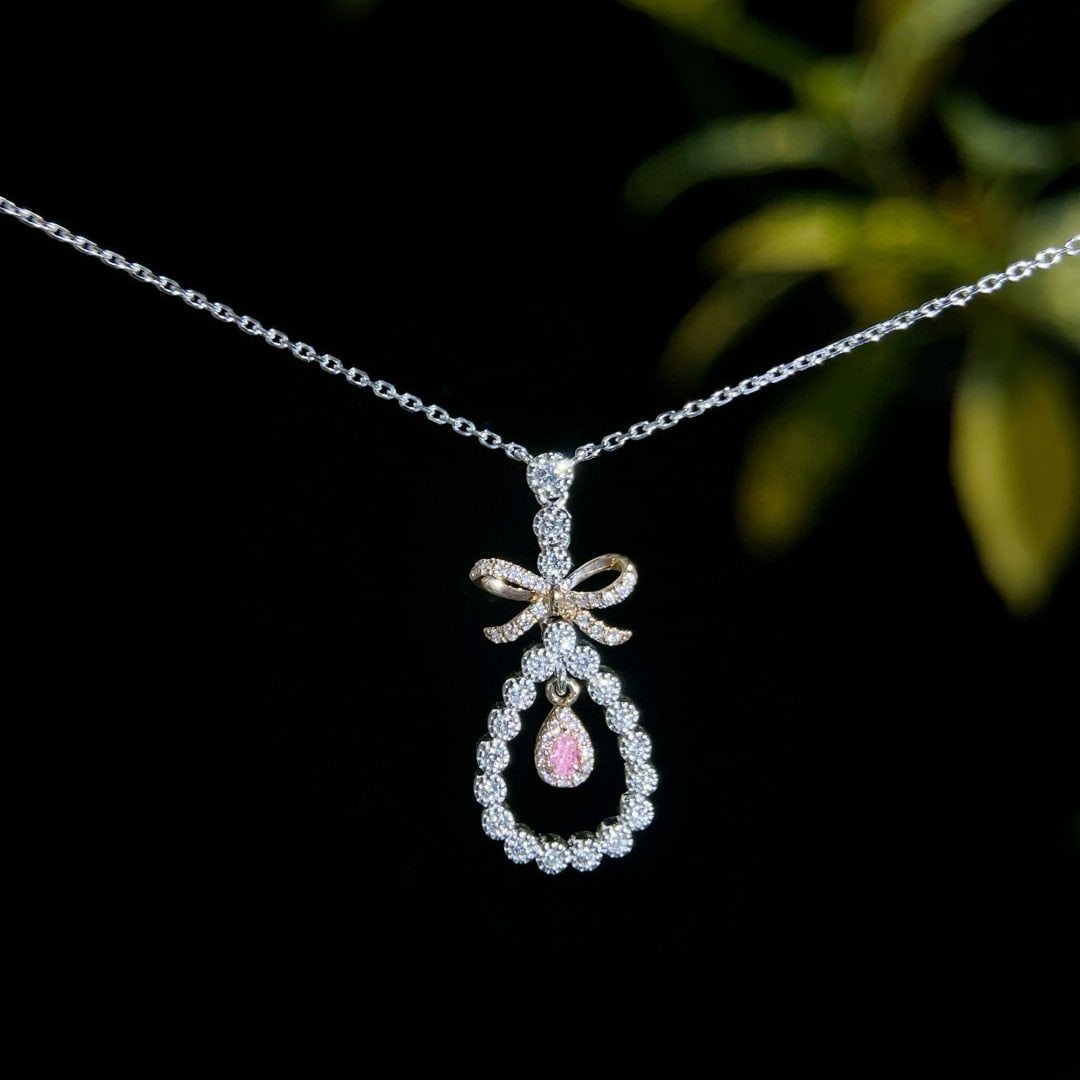 14k Gold 0.34 Ctw Natural Pink Diamond & Diamond Necklace: Ref:231008434 // gold content:14k gold // main gemstone:pink diamond // shape:pear // carat weight:0. 03ct // color:pink // treatment:natural // // adjacent gemstone 2 : diamond // shape:round //