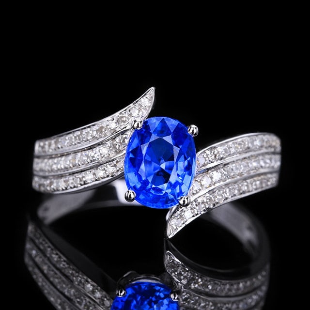 14k Gold 1.51 Ctw Natural Sapphire & Diamond Ring: Ref:231117031 // gold content:14k gold // ring size:7. 25us // // main gemstone:sapphire // shape:oval // carat weight:1. 30ct // color:blue // treatment:natural // // adjacent gemstone 2 : diamond