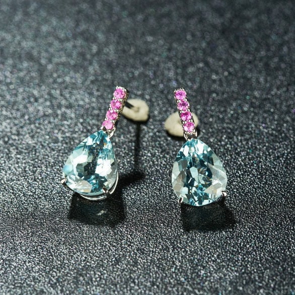 14k Gold 3.89 Ct Natural Aquamarine & Sapphire Earrings: Ref:231117054 // gold content:14k gold // main gemstone:aquamarine // shape:pear // carat weight:3. 89ct // color:blue // treatment:natural // // adjacent gemstone 2 : sapphire // number of stones:8