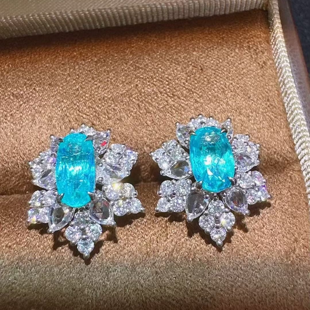 14k Gold 3.99 Ctw Natural Paraiba Tourmaline & Diamond Earrings: Ref:231117144 // gold content:14k gold // main gemstone:paraiba tourmaline // shape:oval // carat weight:2. 08ct // color:blue // treatment:natural // // adjacent gemstone 2 : diamond //