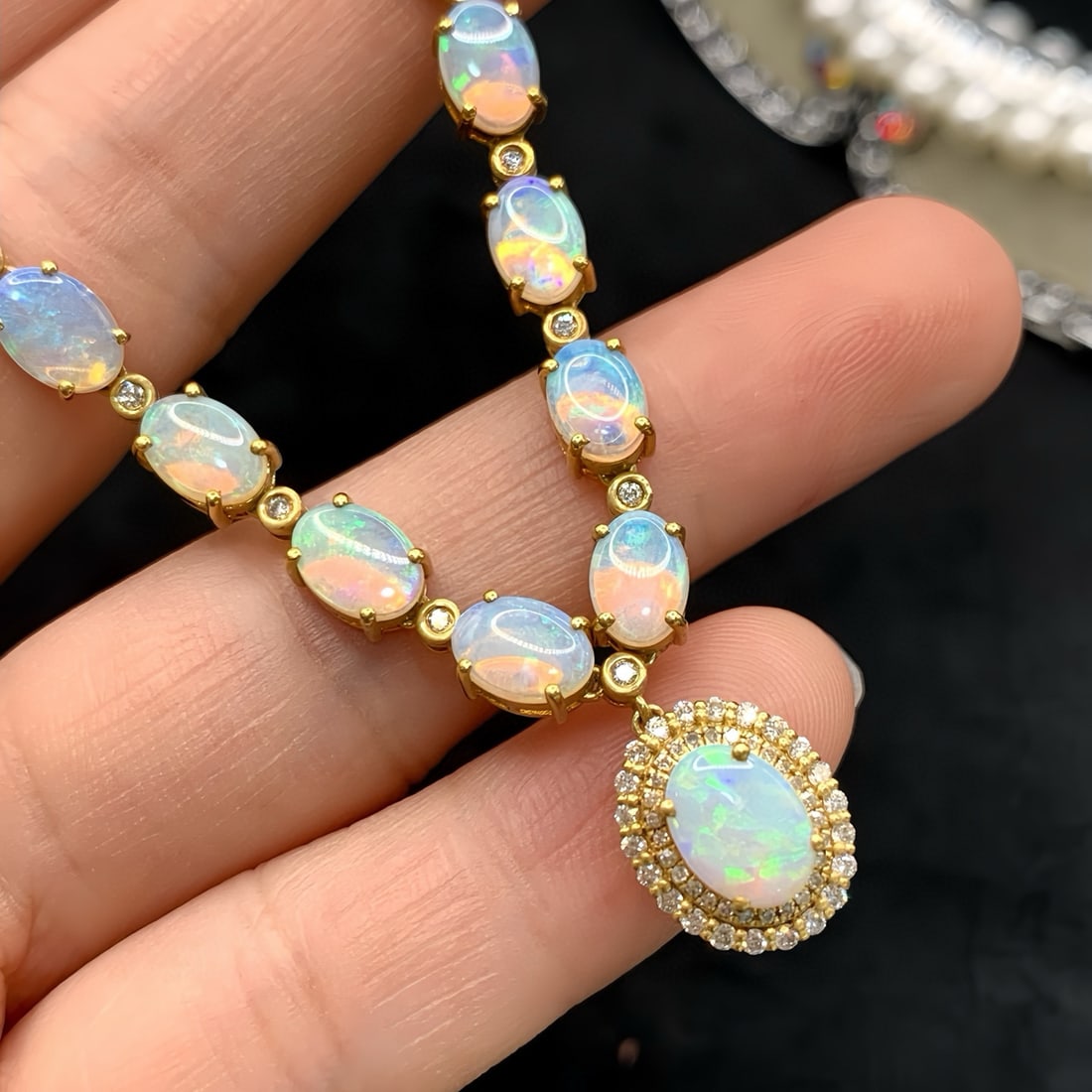 14k Gold 5.78 Ctw Natural Opal & Diamond Necklace: Ref:231117217 // gold content:14k gold // main gemstone:opal // shape:oval // carat weight:5. 35ct // color:color // treatment:natural // // adjacent gemstone 2 : diamond // number of stones:62 //