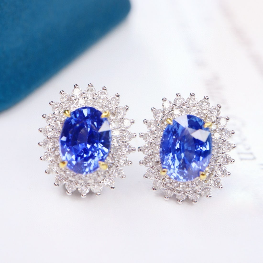 14k Gold 2.77 Ctw Natural Sapphire & Diamond Earrings: Ref:231117253 // gold content:14k gold // main gemstone:sapphire // shape:oval // carat weight:2. 27ct // color:blue // treatment:natural // // adjacent gemstone 2 : diamond // shape:round // carat