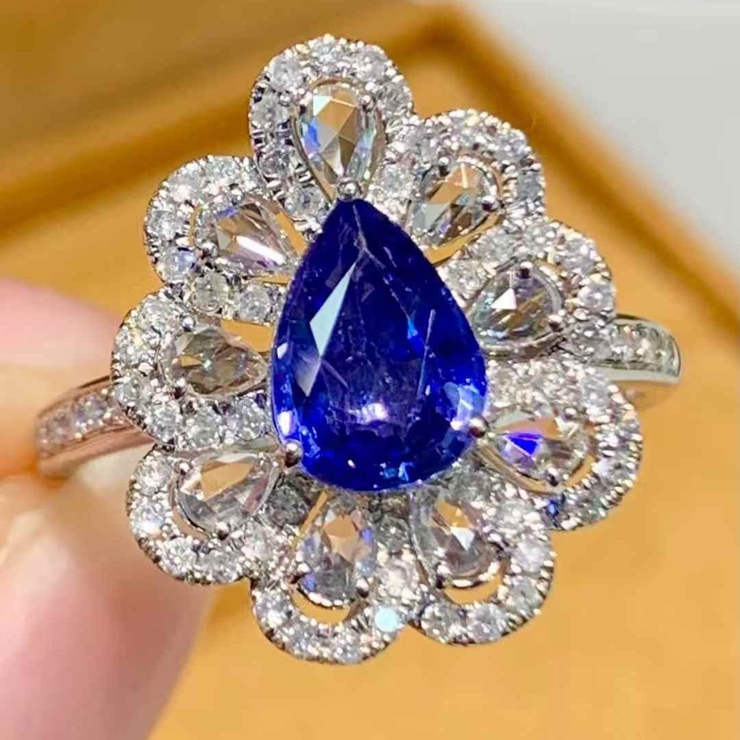 14k Gold 1.1 Ct Natural Sapphire & Diamond Ring: Ref:231117255 // gold content:14k gold // ring size:7. 25us // // main gemstone:sapphire // shape:pear // carat weight:1. 1ct // color:blue // treatment:natural // // adjacent gemstone 2 : diamond //