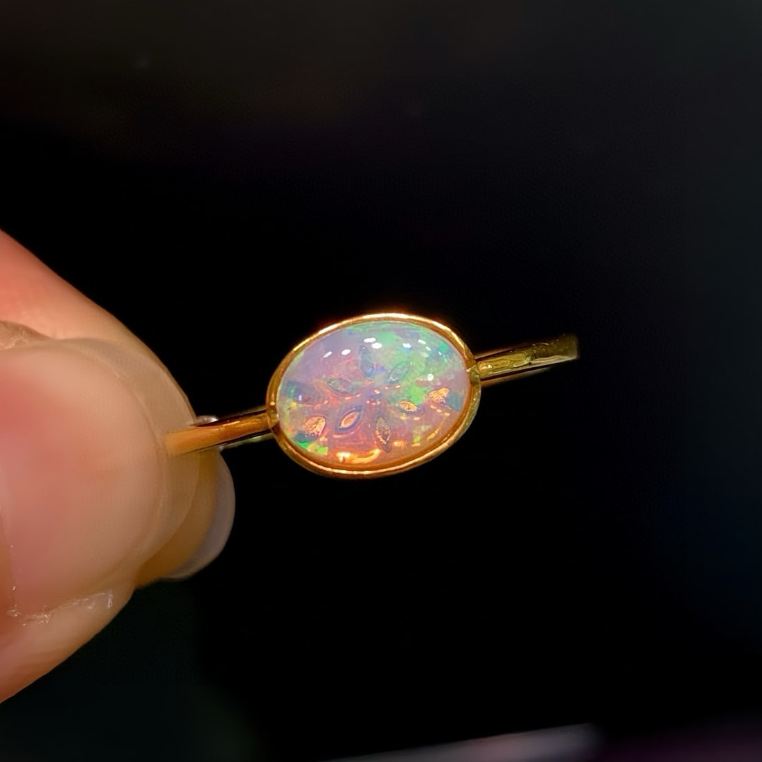 14k Gold 0.70 Ct Natural Opal Ring: Ref:231117259 // gold content:14k gold // ring size:7. 25us // // main gemstone:opal // shape:oval // carat weight:0. 70ct // color:color // treatment:natural // Condition: New Low Estimate: 1600