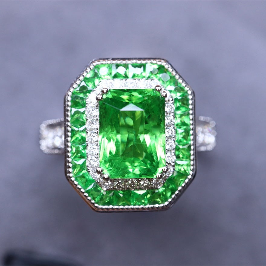 14k Gold 2.40 Ctw Natural Tsavorite & Diamond Ring: Ref:231118012 // gold content:14k gold // ring size:7. 25us // // main gemstone:tsavorite // shape:octagonal // carat weight:2. 16ct // color:green // treatment:natural // // adjacent gemstone 2 : dia
