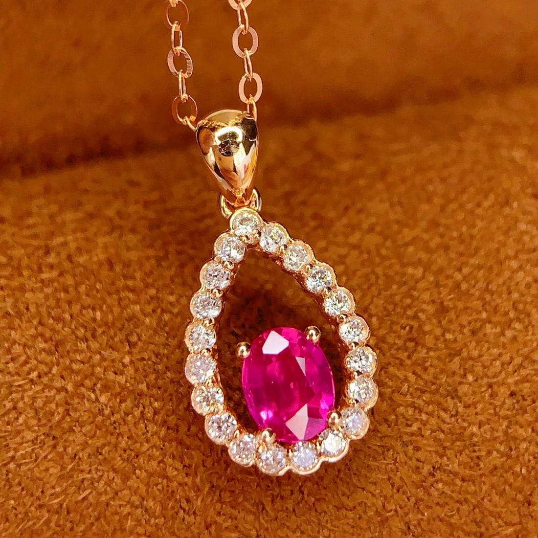 14k Gold 0.5 Ct Natural Ruby & Diamond Pendant( Without Chain ): Ref:231118167 // gold content:14k gold // main gemstone:ruby // shape:oval // carat weight:0. 5ct // color:red // treatment:natural // // adjacent gemstone 2 : diamond // number of stones:20 //