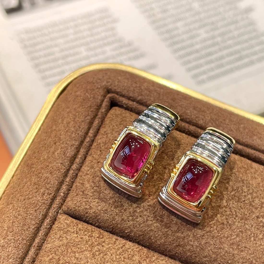 14k Gold 2.4 Ct Natural Tourmaline Earrings: Ref:231118180 // gold content:14k gold // main gemstone:tourmaline // shape:cushion // carat weight:2. 4ct // color:red // treatment:natural // Condition: New Low Estimate: 8300.00 High Estimate: