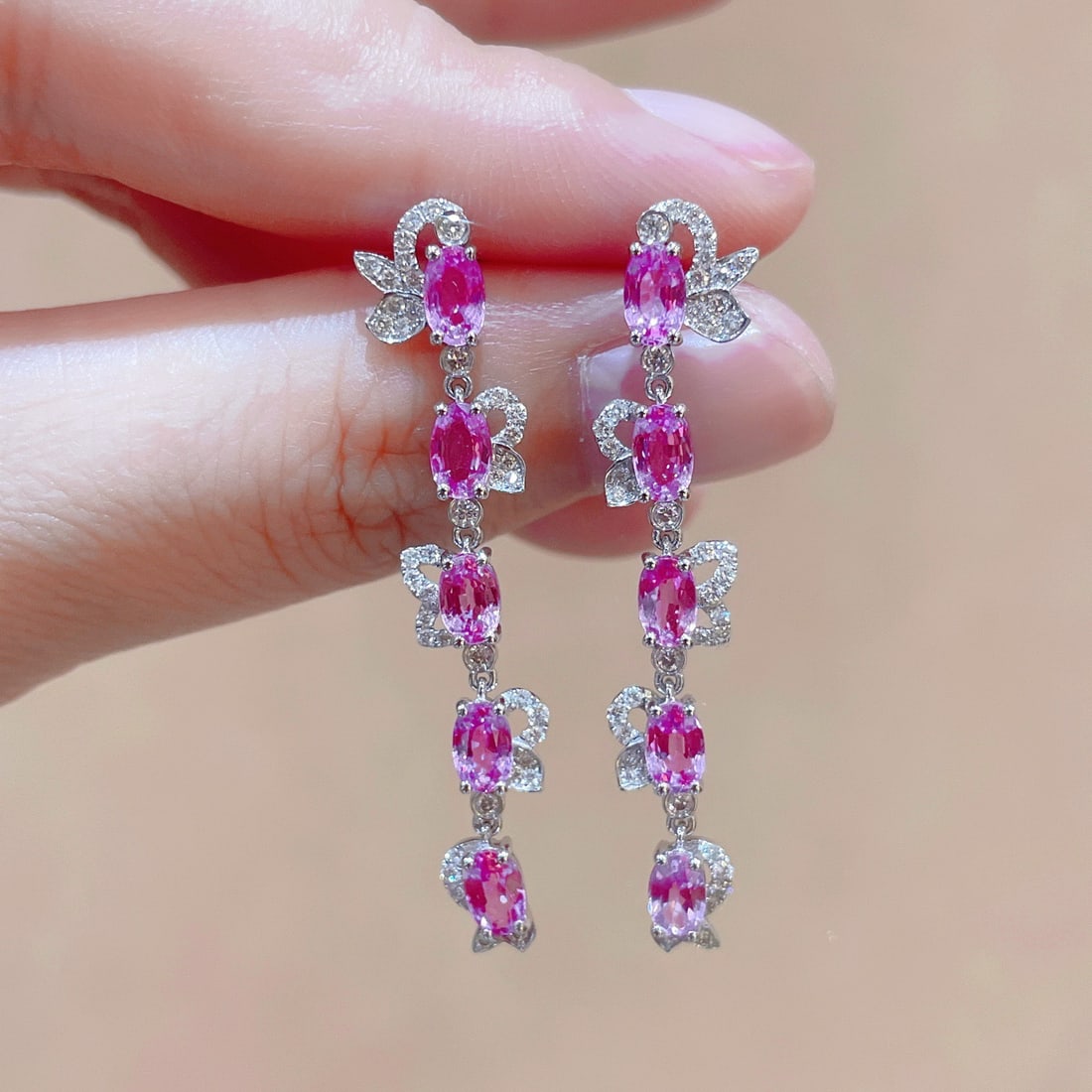 14k Gold 3.81 Ctw Natural Sapphire & Diamond Earrings: Ref:231118217 // gold content:14k gold // main gemstone:sapphire // shape:oval // carat weight:3. 39ct // color:pink // treatment:natural // // adjacent gemstone 2 : diamond // shape:round // carat