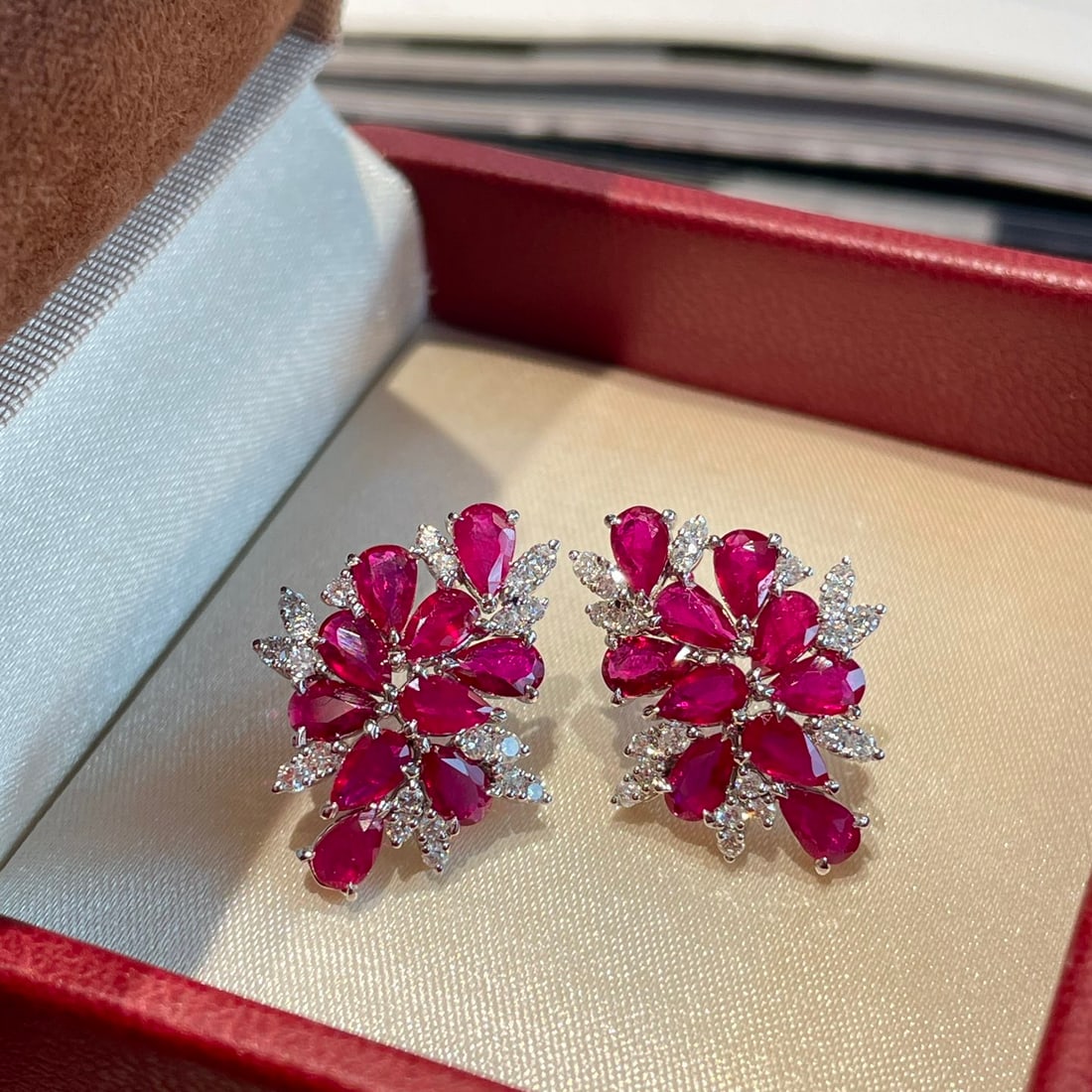 14k Gold 3.4 Ct Natural Ruby & Diamond Earrings: Ref:231118228 // gold content:14k gold // main gemstone:ruby // shape:pear // carat weight:3. 4ct // color:red // treatment:natural // // adjacent gemstone 2 : diamond // shape:round // clarity grade: