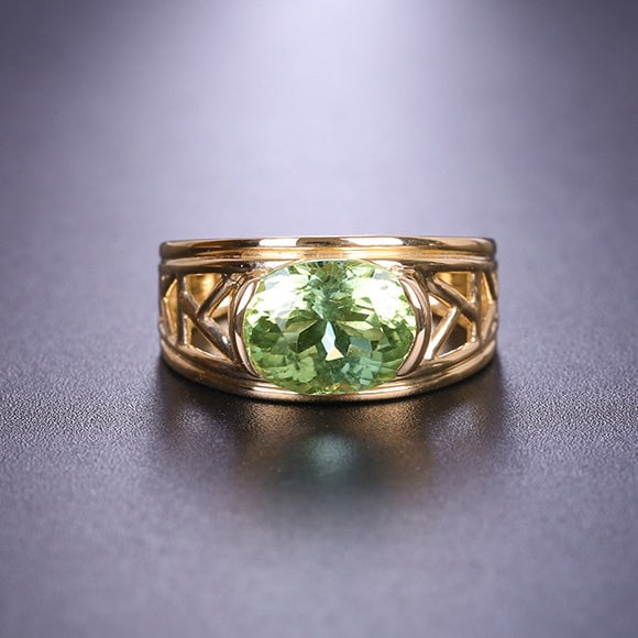 14k Gold 3.3 Ct Natural Tourmaline Ring: Ref:231118243 // gold content:14k gold // ring size:7. 25us // // main gemstone:tourmaline // shape:oval // carat weight:3. 3ct // color:green // treatment:natural // Low Estimate: 4500 Condition: