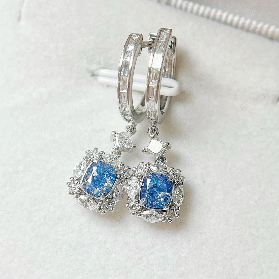 14k Gold 1.72 Ctw Natural Blue Diamond & Diamond Earrings: Ref:231118295 // gold content:14k gold // main gemstone:blue diamond // shape:cushion // carat weight:1. 03ct // color:blue // treatment:natural // // adjacent gemstone 2 : diamond // shape:multiple