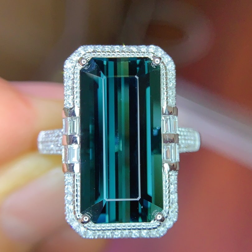 14k Gold 7.39 Ctw Natural Tourmaline & Diamond Ring: Ref:231118328 // gold content:14k gold // ring size:7. 25us // // main gemstone:tourmaline // shape:octagonal // carat weight:6. 93ct // color:blue // treatment:natural // // adjacent gemstone 2 :