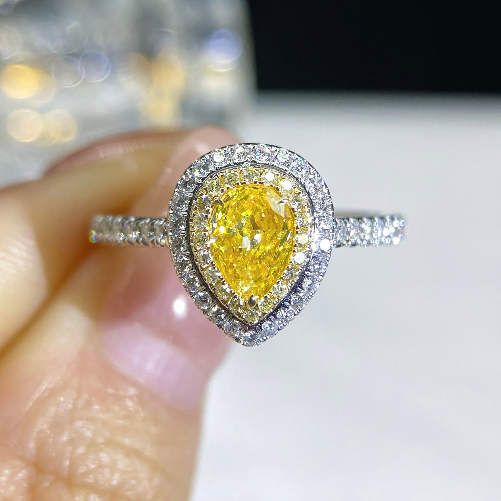 14k Gold 0.84 Ctw Natural Yellow Diamond & Diamond Ring: Ref:231118444 // gold content:14k gold // ring size:7. 25us // // main gemstone:yellow diamond // shape:pear // carat weight:0. 53ct // color:yellow // treatment:natural // // adjacent gemstone 2 :