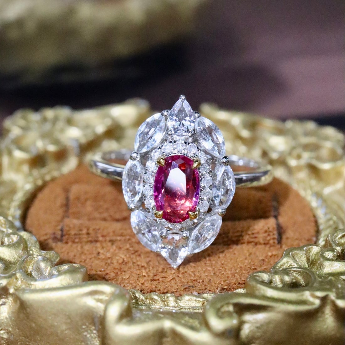 14k Gold 0.66 Ctw Natural Padparadscha Sapphire & Diamond Ring: Ref:231118446 // gold content:14k gold // ring size:7. 25us // // main gemstone:padparadscha sapphire // shape:oval // carat weight:0. 57ct // color:orangish pink // treatment:natural // // adjacent