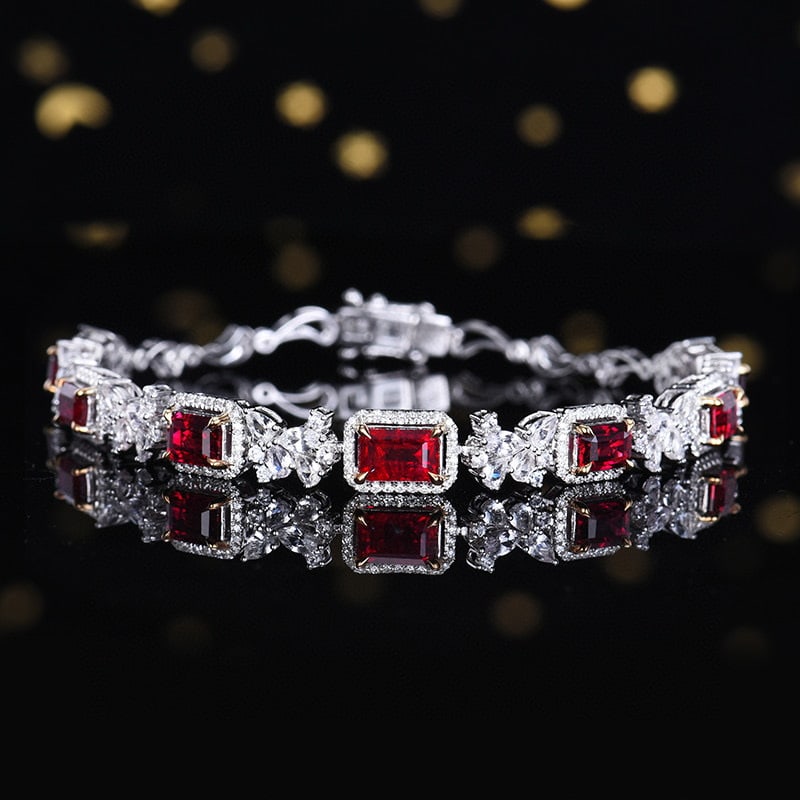 14k Gold 4.56 Ctw Natural Ruby & Diamond Bracelet: Ref:231017001 // gold content:14k gold // main gemstone:ruby // shape:octagonal // carat weight:4. 16ct // color:pigeonblood red // treatment:natural // // adjacent gemstone 2 : diamond // number of s