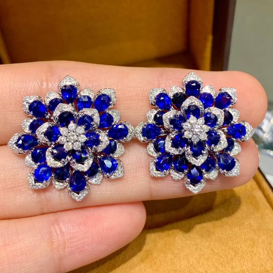14k Gold 9.2 Ct Natural Sapphire & Diamond Earrings: Ref:231017005 // gold content:14k gold // main gemstone:sapphire // shape:pear // carat weight:9. 2ct // color:royal blue // treatment:natural // // adjacent gemstone 2 : diamond // number of