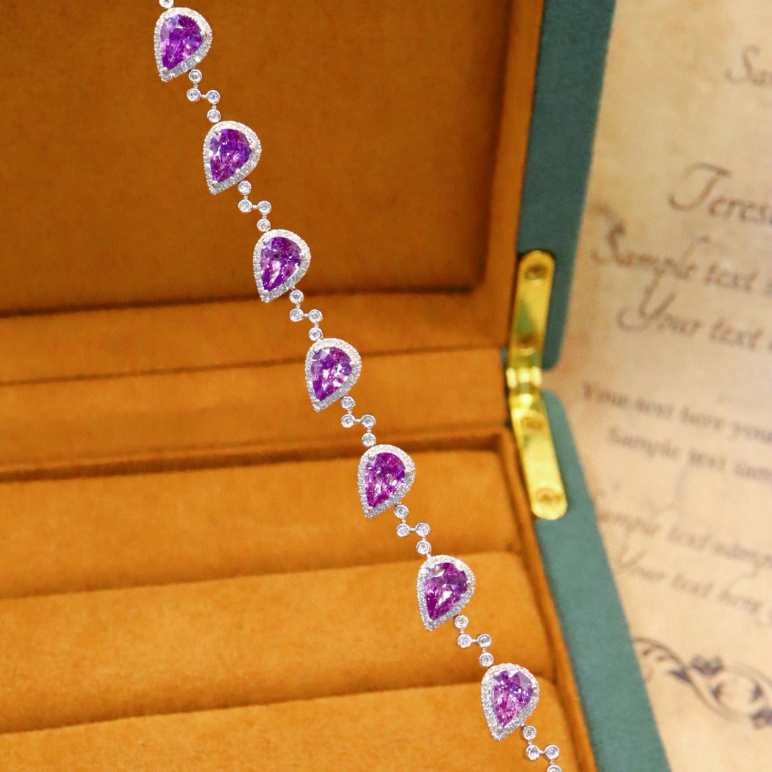 14k Gold 5.32 Ctw Natural Sapphire & Diamond Bracelet: Ref:231017023 // gold content:14k gold // main gemstone:sapphire // shape:pear // carat weight:4. 68ct // color:purple // treatment:natural // // adjacent gemstone 2 : diamond // number of stones:193 