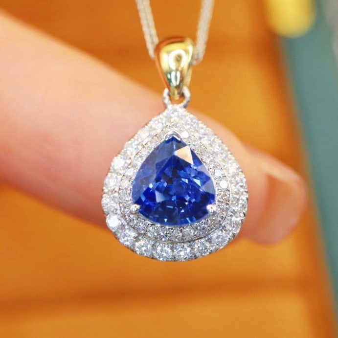 14k Gold 1.41 Ctw Natural Sapphire & Diamond Pendant( Without Chain ): Ref:231017024 // gold content:14k gold // main gemstone:sapphire // shape:pear // carat weight:1. 13ct // color:cornflower blue // treatment:natural // // adjacent gemstone 2 : diamond // number of