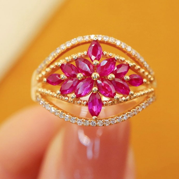 14k Gold 0.90 Ctw Natural Ruby & Diamond Ring: Ref:231017034 // gold content:14k gold // ring size:7. 25us // // main gemstone:ruby // shape:marquise // carat weight:0. 76ct // color:red // treatment:natural // // adjacent gemstone 2 : diamond // 