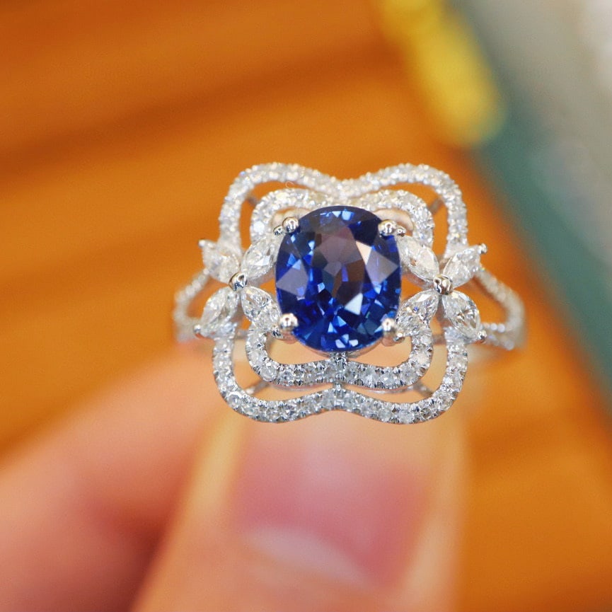 14k Gold 1.88 Ctw Natural Sapphire & Diamond Ring: Ref:231017039 // gold content:14k gold // ring size:7. 25us // // main gemstone:sapphire // shape:oval // carat weight:1. 39ct // color:blue // treatment:natural // // adjacent gemstone 2 : diamond