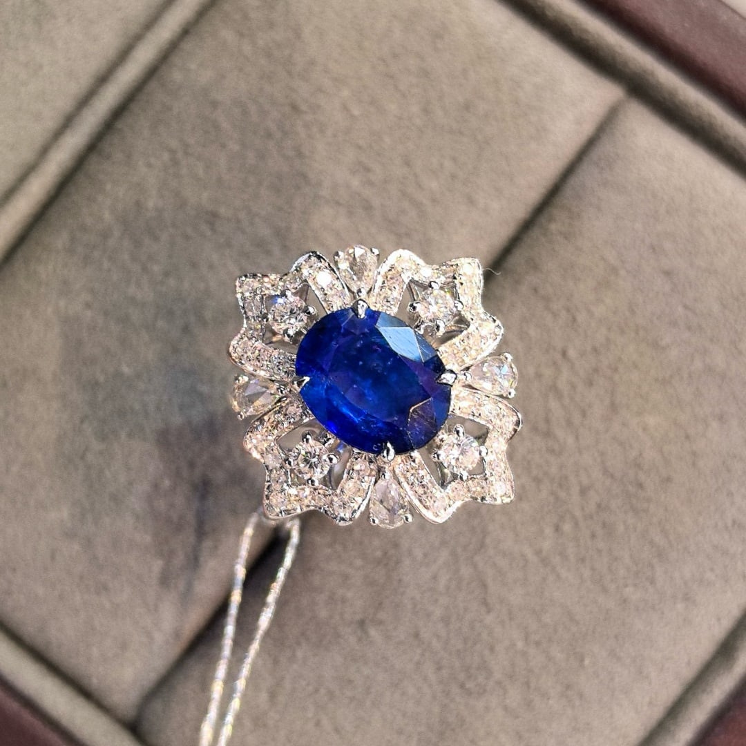 14k Gold 2.64 Ctw Natural Sapphire & Diamond Ring: Ref:231017045 // gold content:14k gold // ring size:7. 25us // // main gemstone:sapphire // shape:oval // carat weight:2. 11ct // color:royal blue // treatment:natural // // adjacent gemstone 2 :