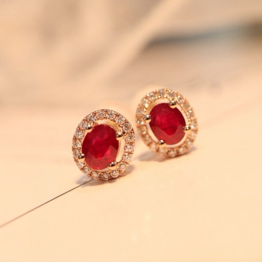 14k Gold 0.63 Ctw Natural Ruby & Diamond Earrings: Ref:231017064 // gold content:14k gold // main gemstone:ruby // shape:oval // carat weight:0. 51ct // color:red // treatment:natural // // adjacent gemstone 2 : diamond // shape:round // carat